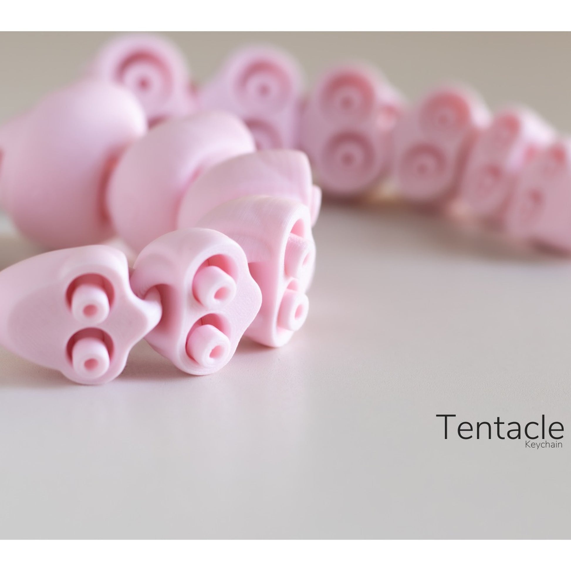 Tentacle Keychain 3D printed collectible by MUNORI